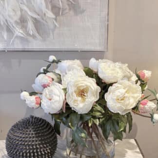 White peony arrangement in glass vase