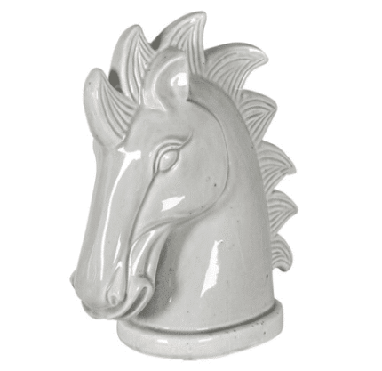 Grey glazed ceramic horse head sculpture on white background