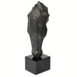 abstract black horse head sculpture on black plinth