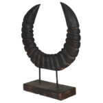 dark brown carved horn sculpture