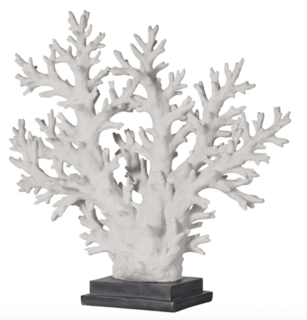 large white faux coral tree sculpture on iron stand
