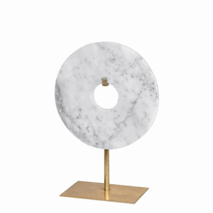 small white marble disc sculpture on gold Stand