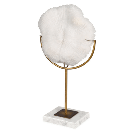 white faux coral sculpture on marble gold stand